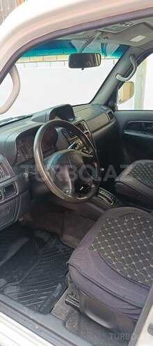 Mitsubishi Pajero io-5