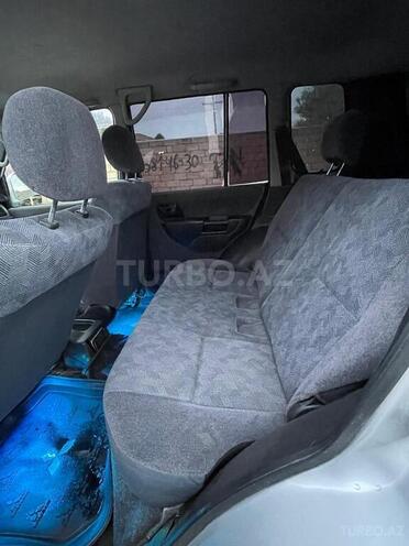 Mitsubishi Pajero io-13