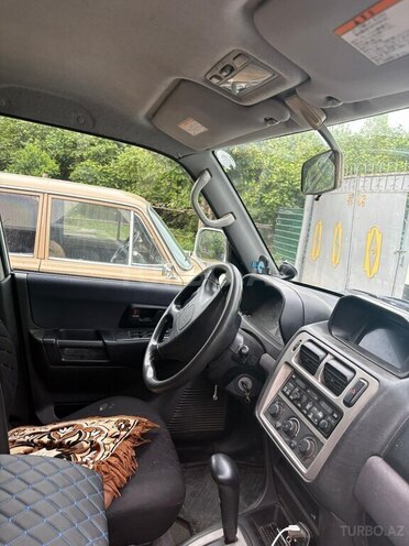 Mitsubishi Pajero io-3