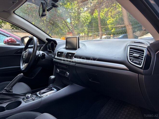 Mazda 3-12