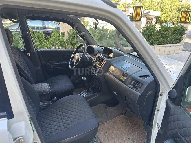 Mitsubishi Pajero io-5