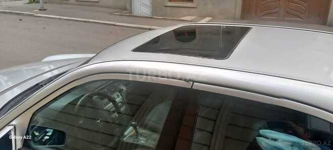 Mercedes E 230-11