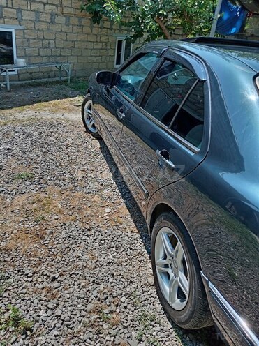 Mercedes E 230-4