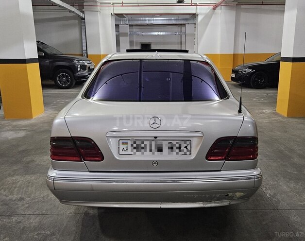 Mercedes E 320-7