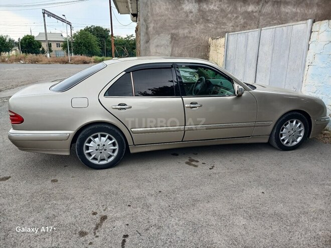 Mercedes E 320-7