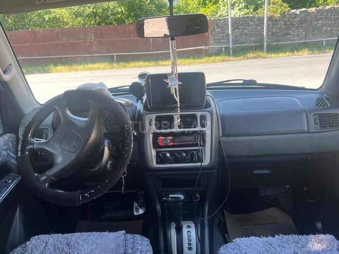 Mitsubishi Pajero io-3