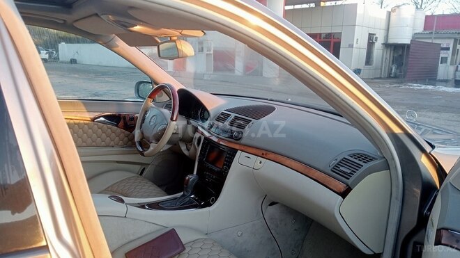 Mercedes E 320-7