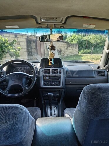 Mitsubishi Pajero io-5