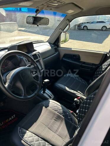 Mitsubishi Pajero io-5