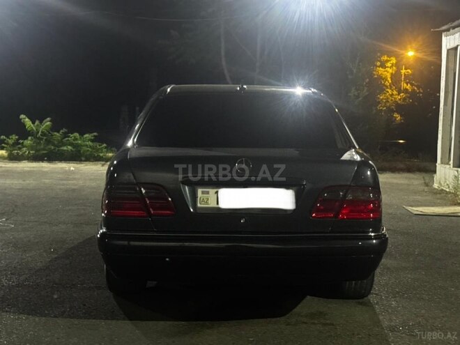 Mercedes E 230-3