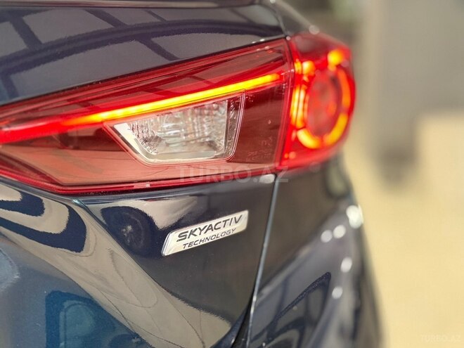 Mazda 3-6