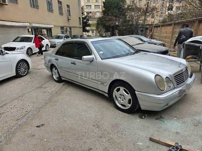 Mercedes E 230-3