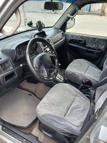 Mitsubishi Pajero io-5