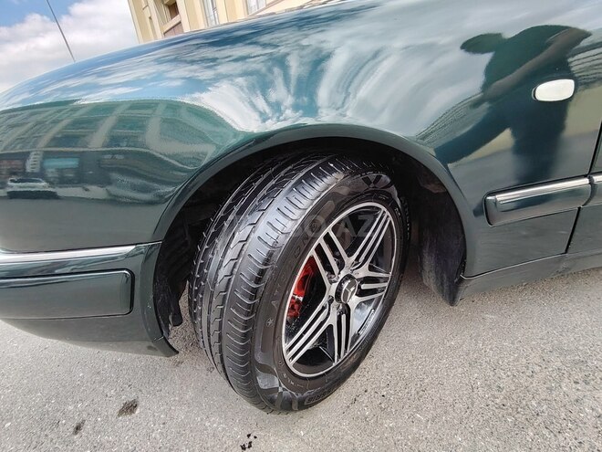 Mercedes E 230-9