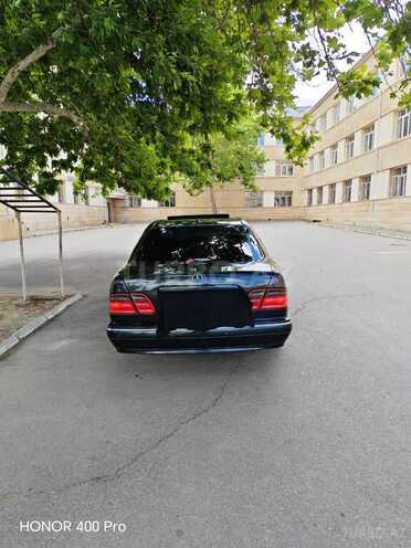 Mercedes E 320-7