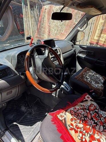 Mitsubishi Pajero io-4