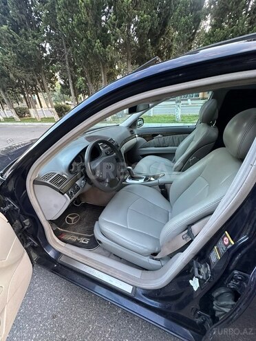 Mercedes E 320-21