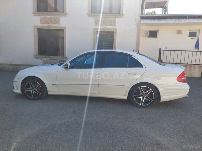 Mercedes E 320-21