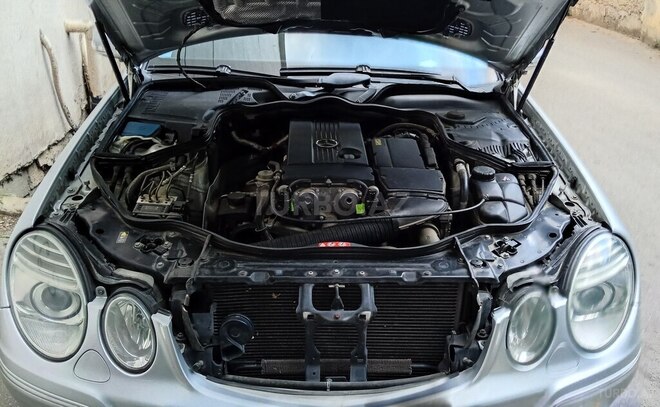 Mercedes E 200-13