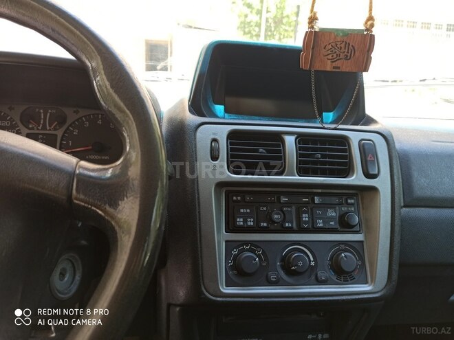 Mitsubishi Pajero io-4