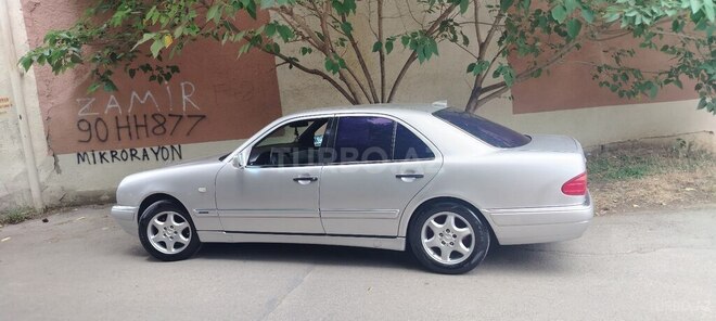 Mercedes E 230-11