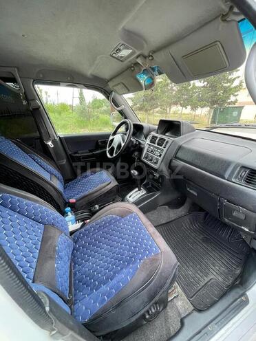 Mitsubishi Pajero io-4