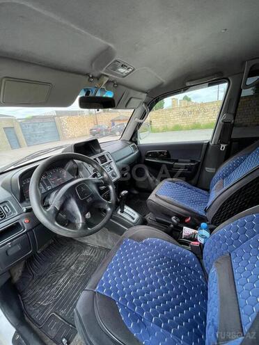 Mitsubishi Pajero io-3