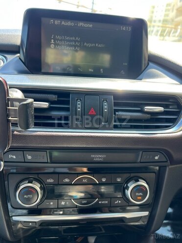 Mazda 6-9