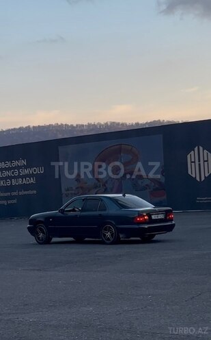 Mercedes E 230-3
