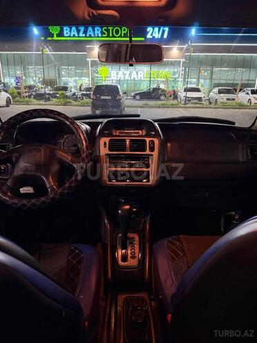 Mitsubishi Pajero io-5