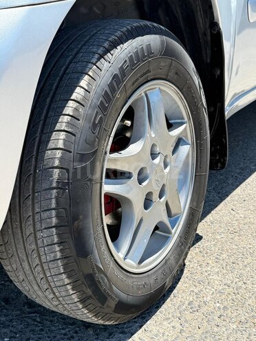 Chery Tiggo (T11)-4