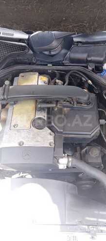 Mercedes E 230-11