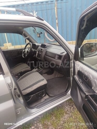 Mitsubishi Pajero io-4