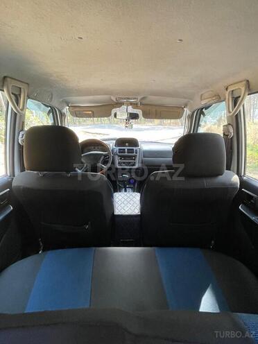 Mitsubishi Pajero io-6