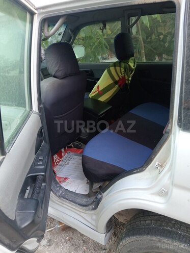 Mitsubishi Pajero io 1999, 999,000 km - 1.8 l - Bakı