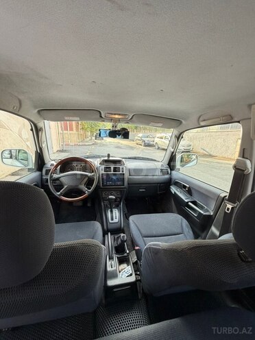 Mitsubishi Pajero io 2001, 239,000 km - 1.8 l - Bakı