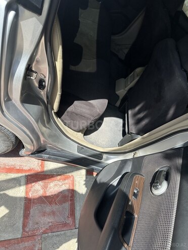 Nissan Tiida 2007, 314,175 km - 1.6 l - Bərdə