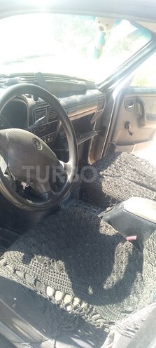 GAZ 31105 2004, 429,730 km - 2.4 l - Saatlı