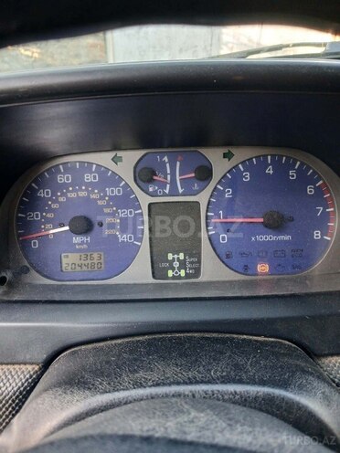 Mitsubishi Pajero io 2003, 204,480 km - 2.0 л - Qax