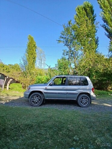 Mitsubishi Pajero io 2003, 204,480 km - 2.0 л - Qax