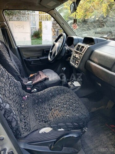 Mitsubishi Pajero io 2003, 204,480 km - 2.0 л - Qax