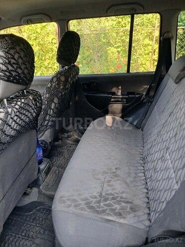 Mitsubishi Pajero io 2003, 204,480 km - 2.0 л - Qax