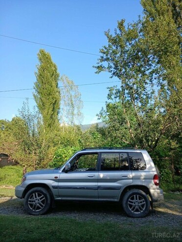 Mitsubishi Pajero io 2003, 204,480 km - 2.0 л - Qax