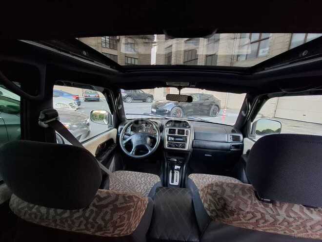 Mitsubishi Pajero io 1998, 254,215 km - 1.8 l - Bakı