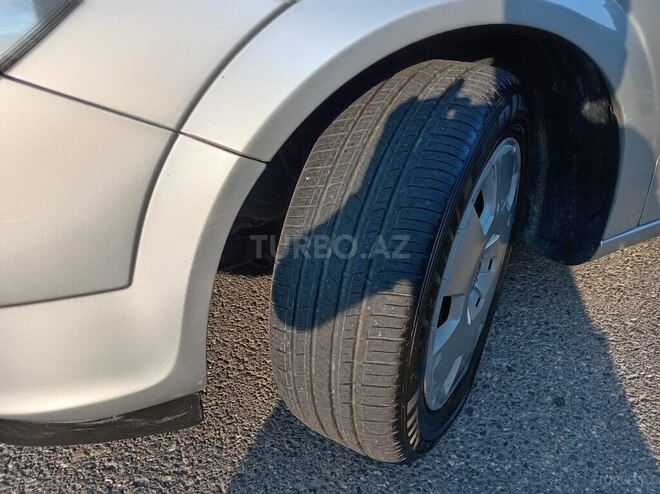 Opel Astra 2006, 288,000 km - 1.6 l - Qusar