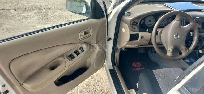 Nissan Sunny 2006, 230,000 km - 1.3 l - Saatlı