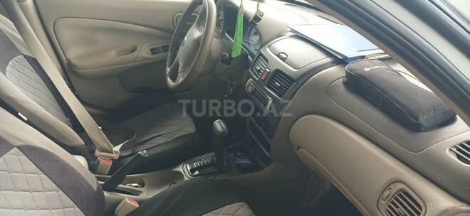 Nissan Sunny 2006, 230,000 km - 1.3 l - Saatlı