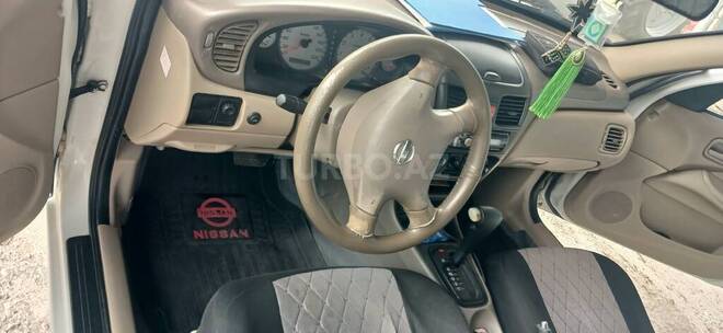Nissan Sunny 2006, 230,000 km - 1.3 l - Saatlı