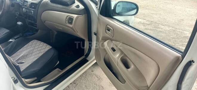 Nissan Sunny 2006, 230,000 km - 1.3 l - Saatlı