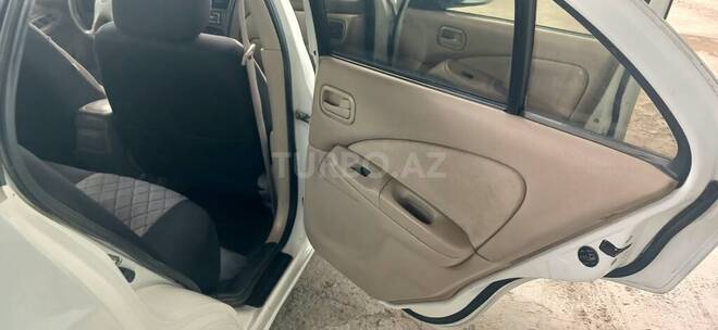 Nissan Sunny 2006, 230,000 km - 1.3 l - Saatlı
